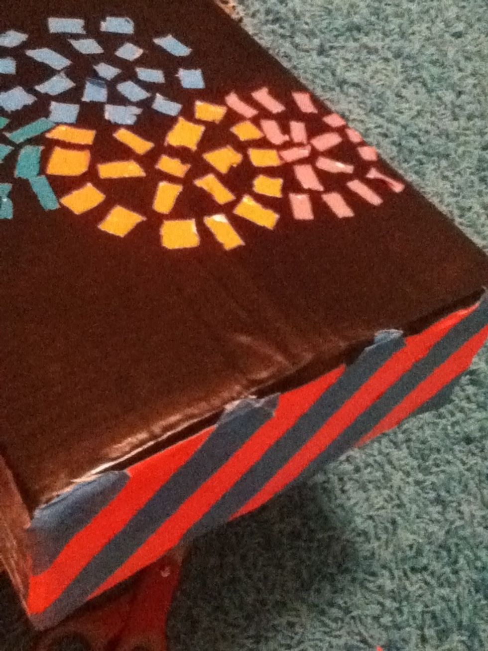 After you add details, look for a good place to insert a hole for candy or streamers.