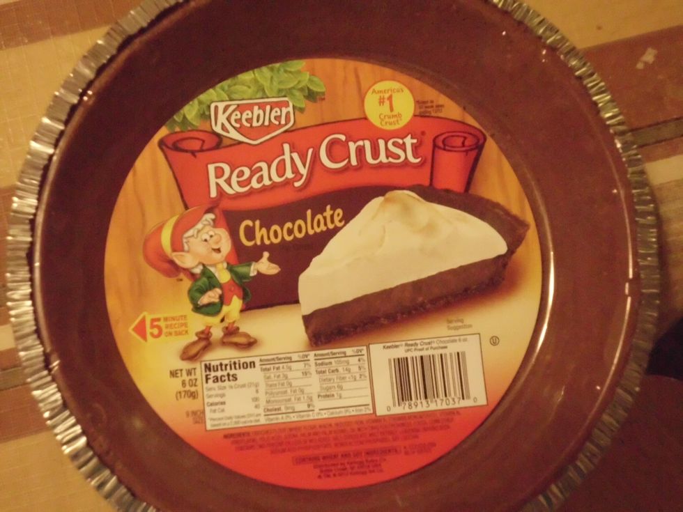 After you are done mixing it together take it, and pour the mixture into the pie crust. "please note you do not have to use the graham cracker pie crust, any pie pie crust will do just fine".