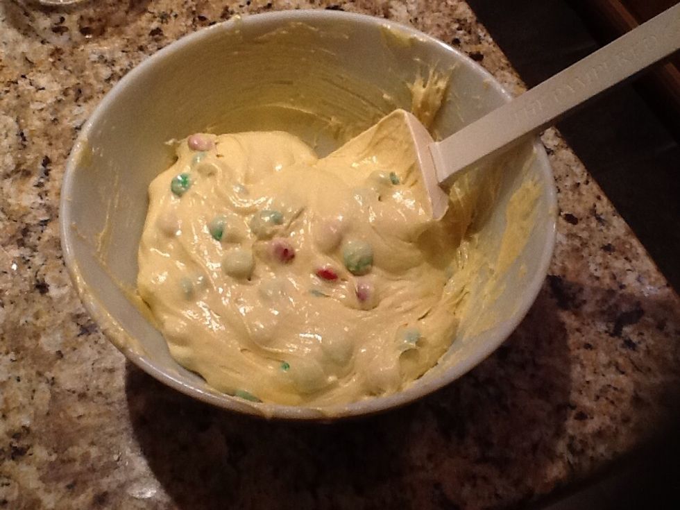 After you are done whisking, add in 1 cup of M&M's