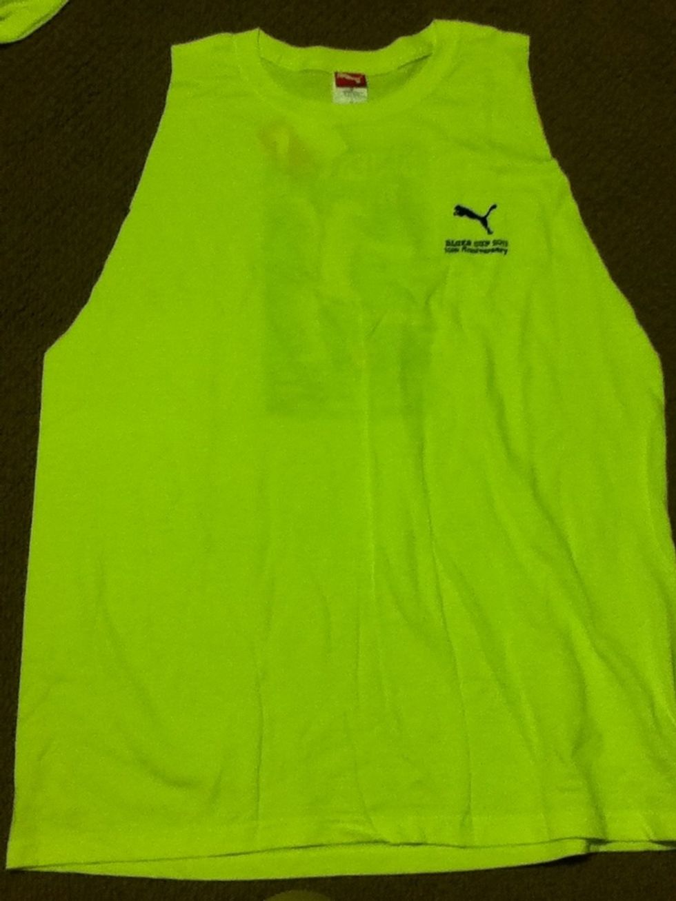 After you cut off both the sleeves it should look some what close to this or exactly like this