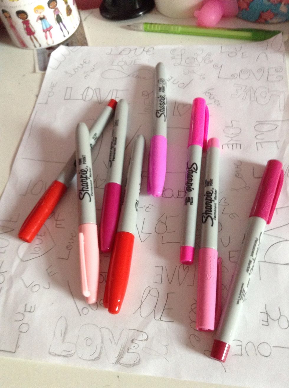 After you finish the words pick your colors and start tracing. I choose variations of red and pink because I chose the word love.