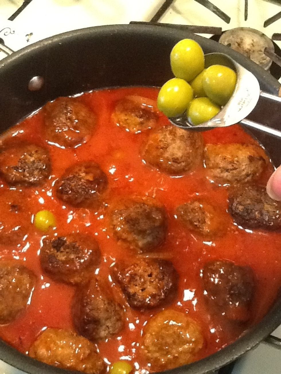After you have added the meatballs we will add some olives