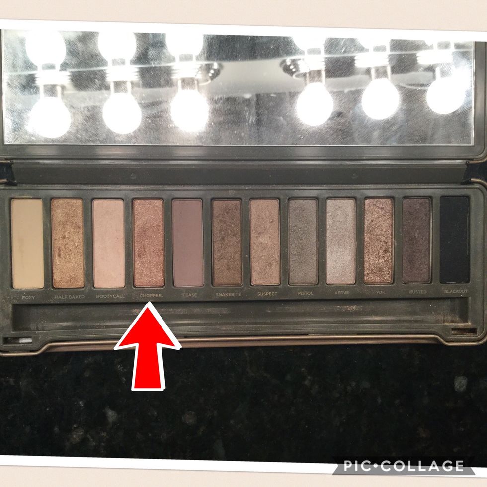 After you have blended "tease" in, take your flat eyeshadow brush and put "chopper" on it and apply it to the middle of your eyelid to the outer corner.