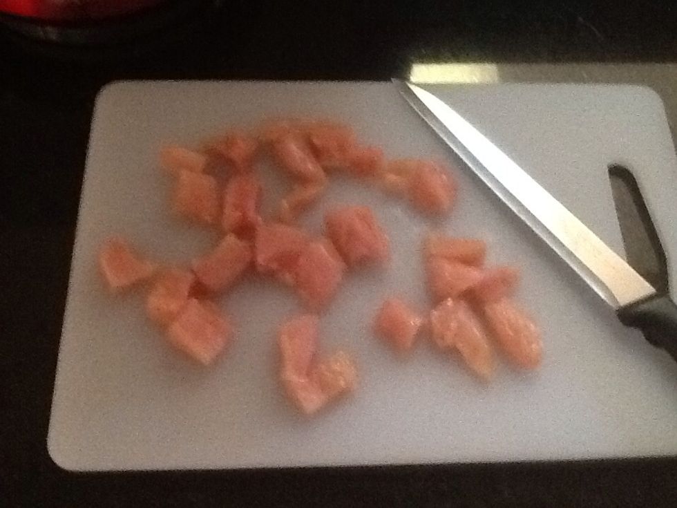 After you have finished dice up the chicken into little cubes. The method that is used is pork dicing. Instead of pork I used chicken.