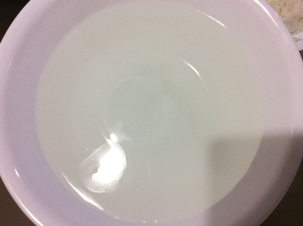 After you have prepared everything, get a big bowl of warm water so that you can place your rice paper in it so it can be a bit wet to get it to stick.