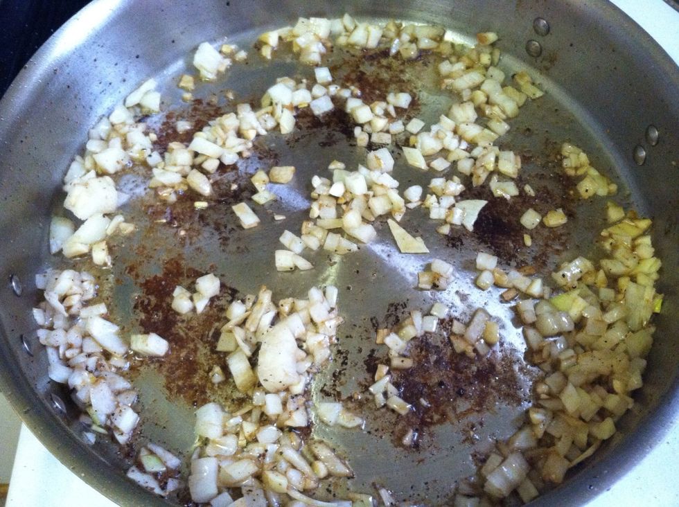 After you have removed all the ribs from the pan, pour off all but about 1 tablespoon of fat from the pan. Next add your onion and garlic and saut\u00e9 until softened.
