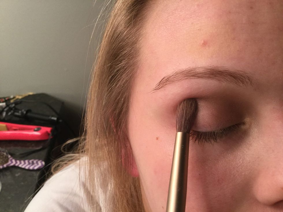 After you have "tease" take your brush and rub it into the crease of your eyelid and then blend it out so there are no harsh lines.