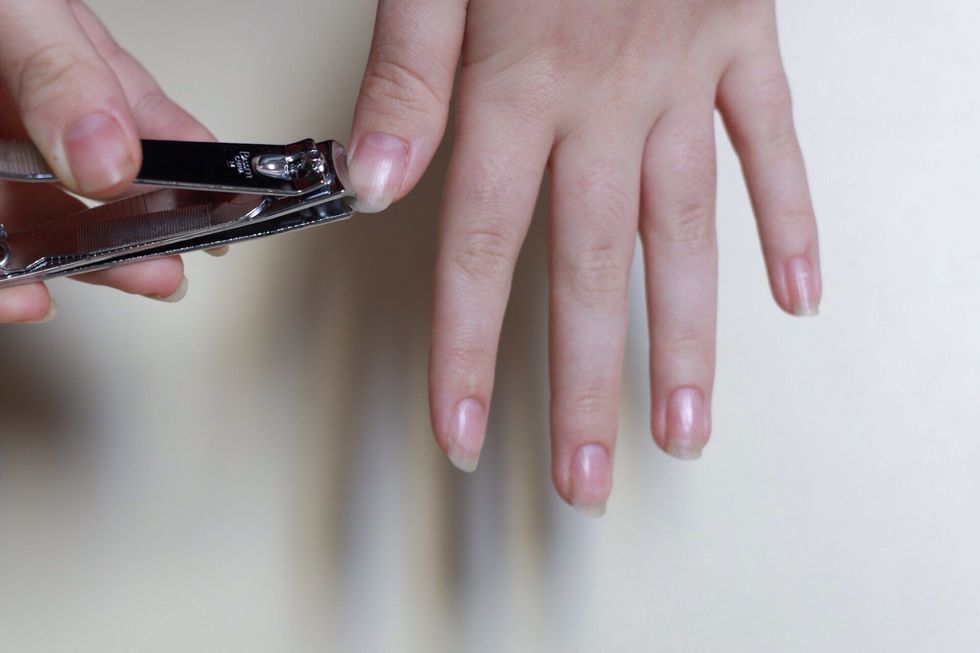 After you have washed your hands and you have your nail clipper, you want to clip your nails to desired length.