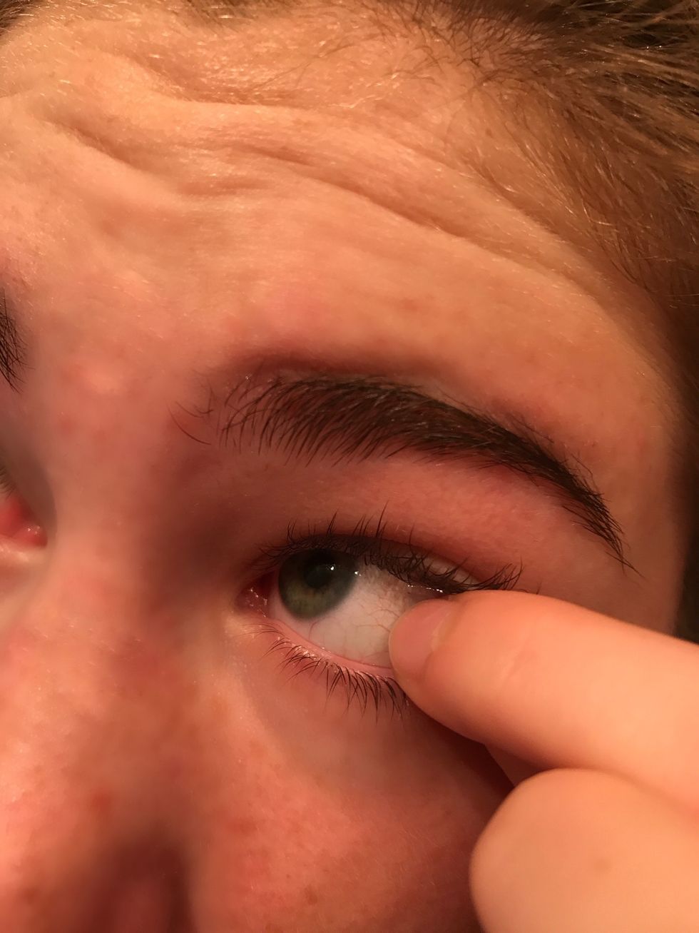 After you have worn your contacts all day, locate where they are in your eyes and punch them out.