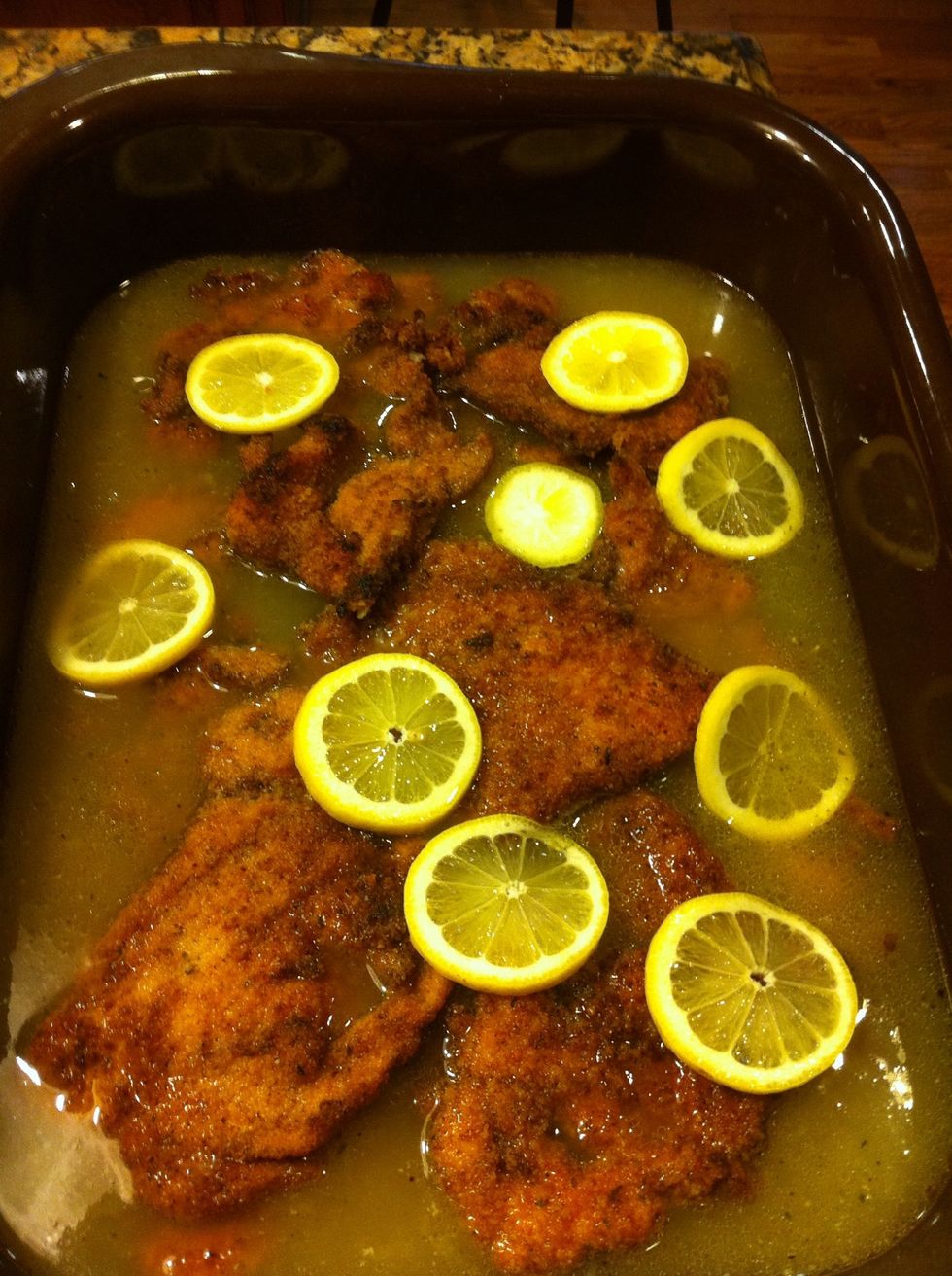 After you let the wine boil for a few minutes add 4 C chicken broth and the juice of your lemons. Cover and bake 350\u2022 until its boiling. About 30-40 minutes.