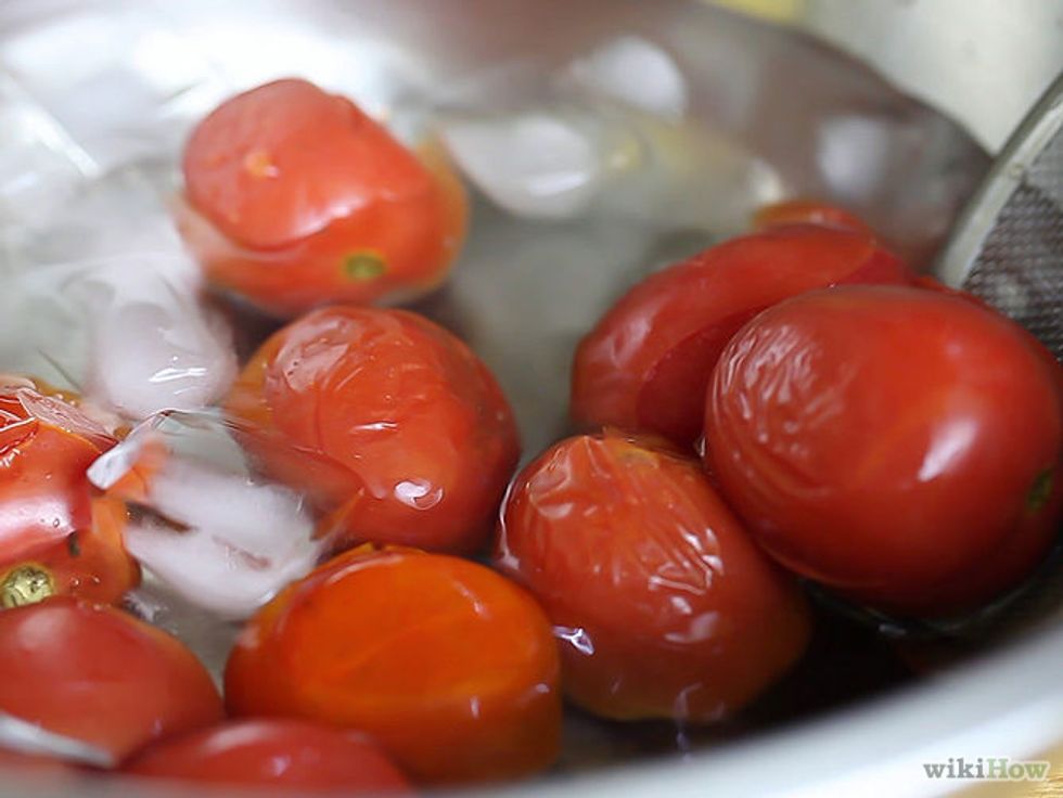 After you let them sit in the large bowl, remove them and put them in a large bowl of cold water, let them sit for 5 minutes or until they start to break.