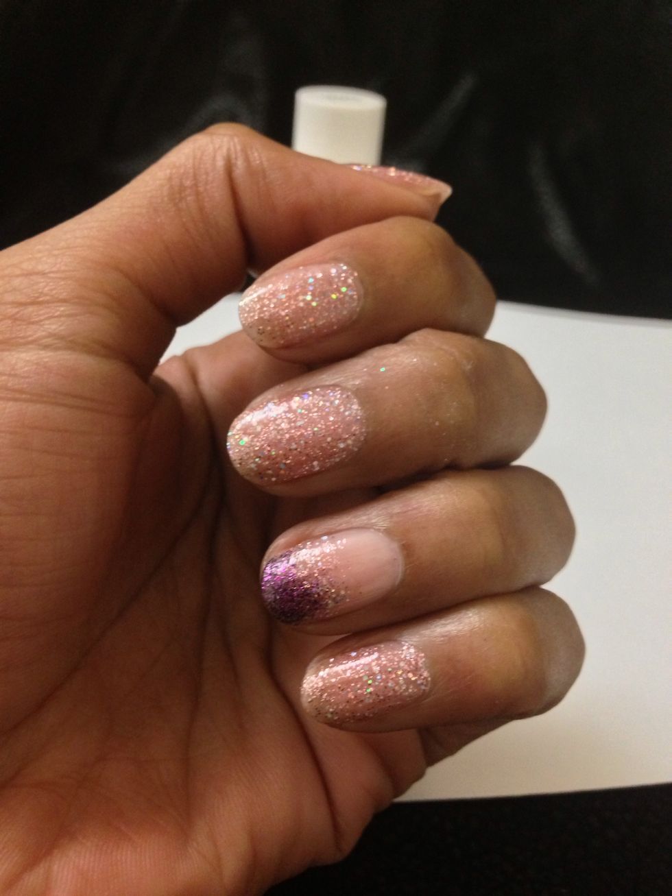 After you paint your top coat wait a minute before applying your liquid quick dry.