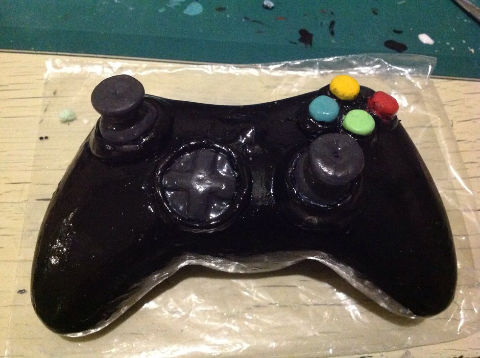 After you paste it with white glue you will most likely need to use more epoxy clay to adhere the parts correctly, then paint over it again to clear any imperfection. And you're done!