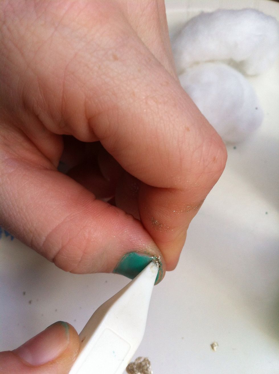 After you put the accent color on the tip of your tool, start at the tip of your nail and drag the tool the point you want your flower to end!