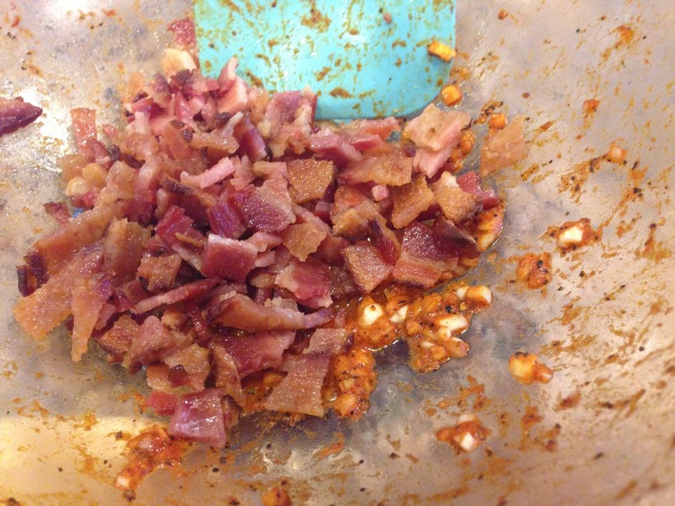 After you remove the Brussels sprouts from the grill, set them aside to cool and add chopped bacon to the same bowl you used to mix the spices and Brussels sprouts.