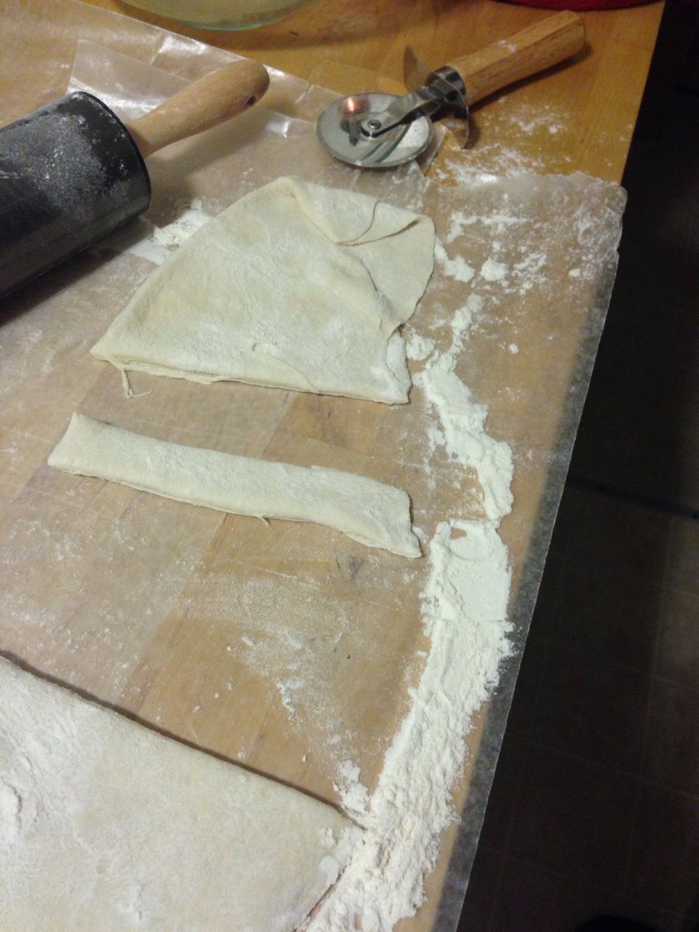 After you roll the dough, cut it into strips.