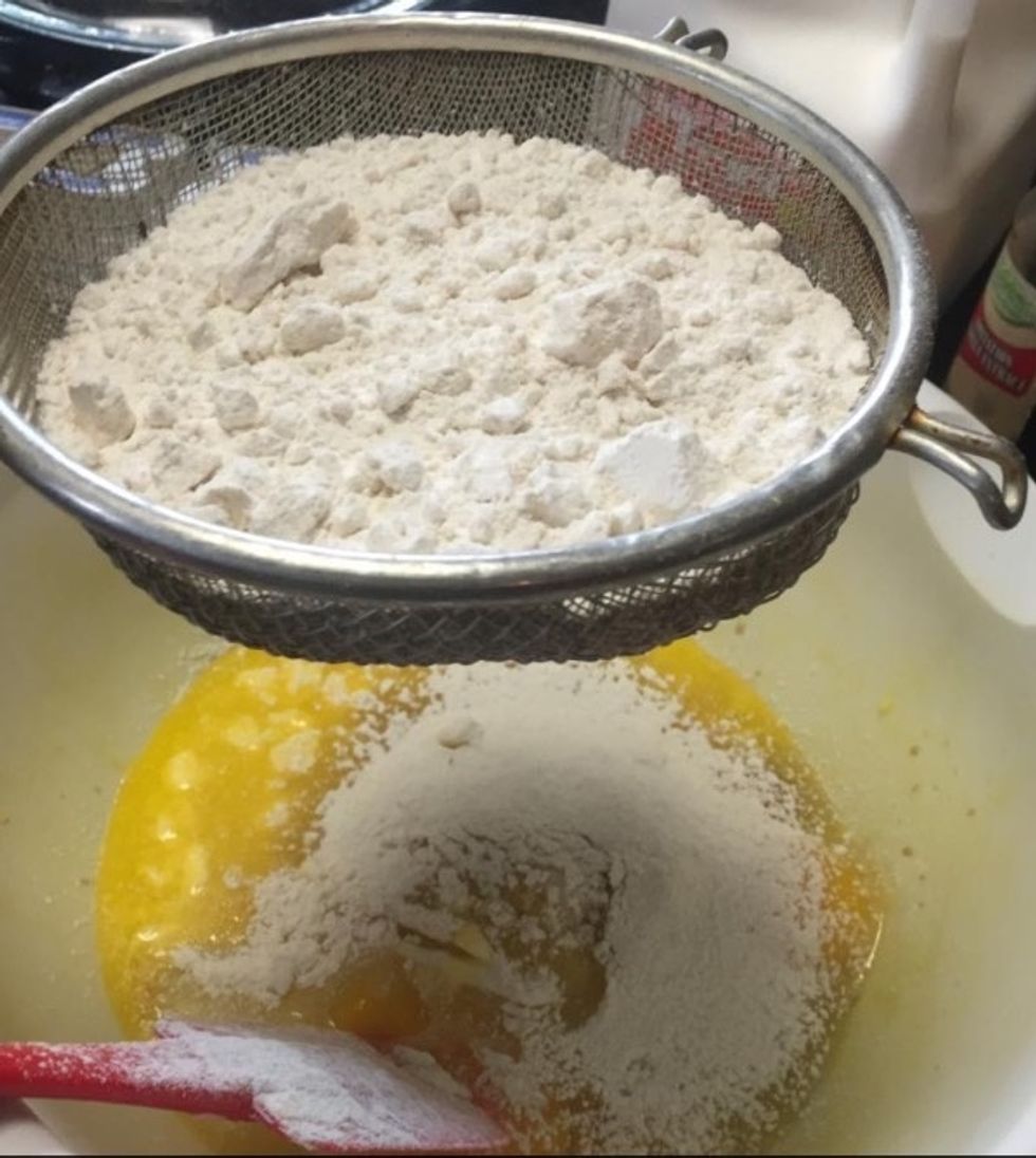 (After you set your oven to 350 degrees)  Take your dry ingredients , 2 eggs, 1/2 of butter ,1/2 cups of milk and pour them into your mixing bowl.