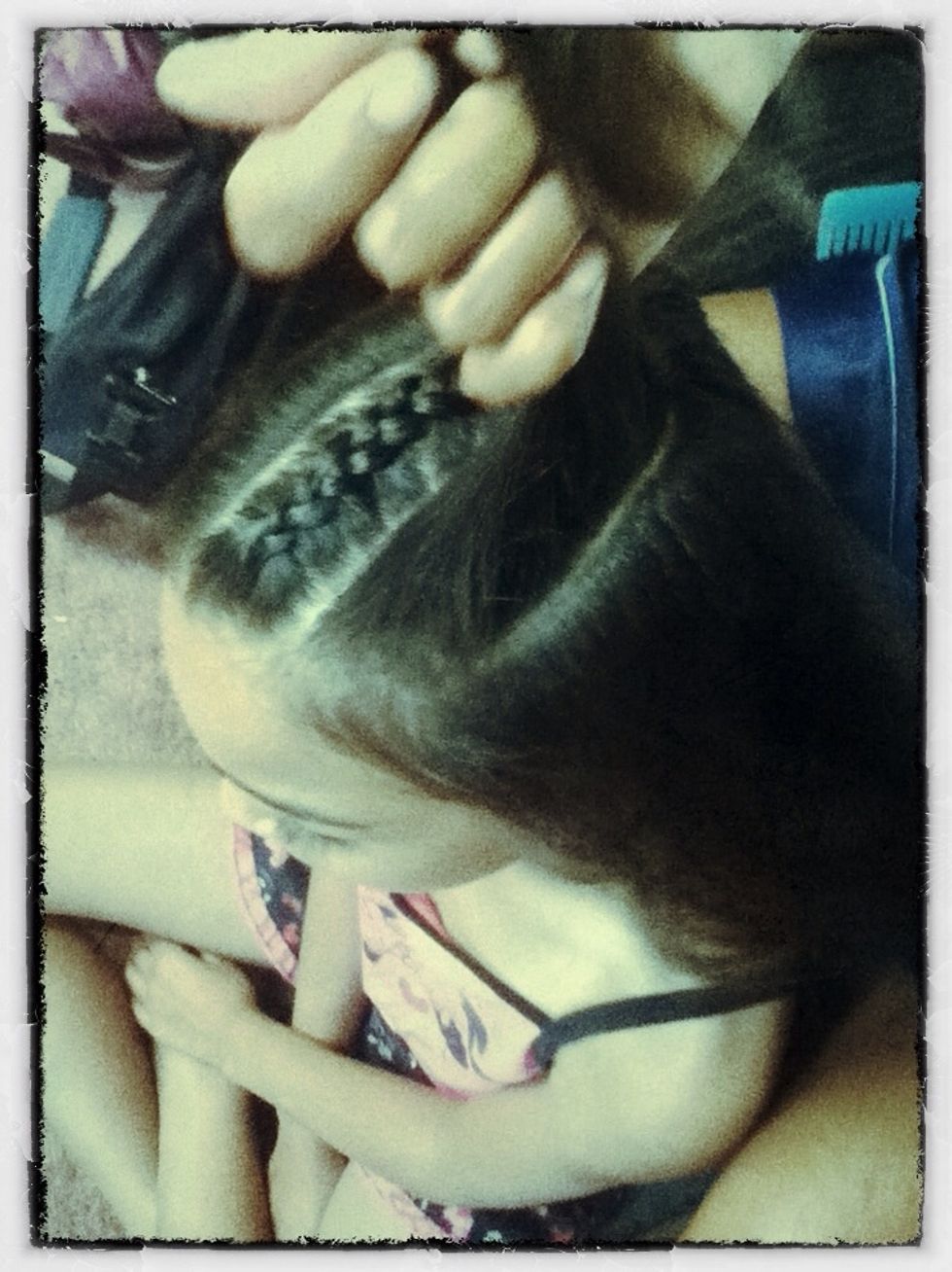 After you split your hair, you go to the front of your hair and take a piece of hair like the one above