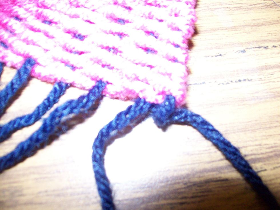 After you tie it once, secure the knot with a second knot on top.