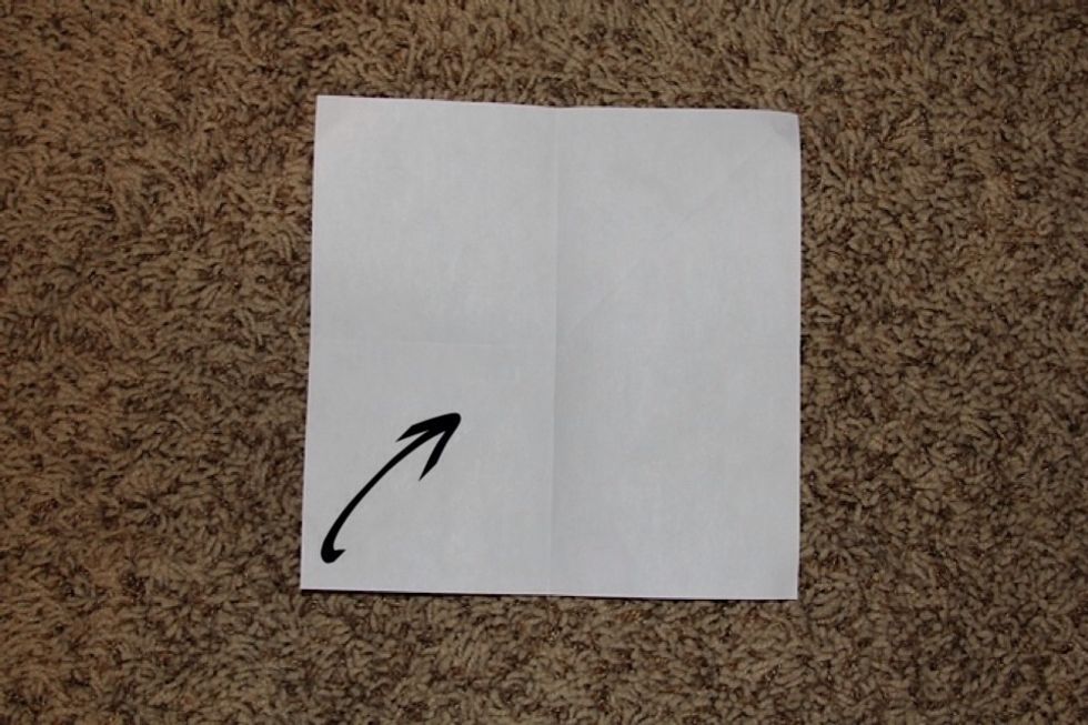 After you unfold it, the paper should look like this! Now just fold up the corners :)