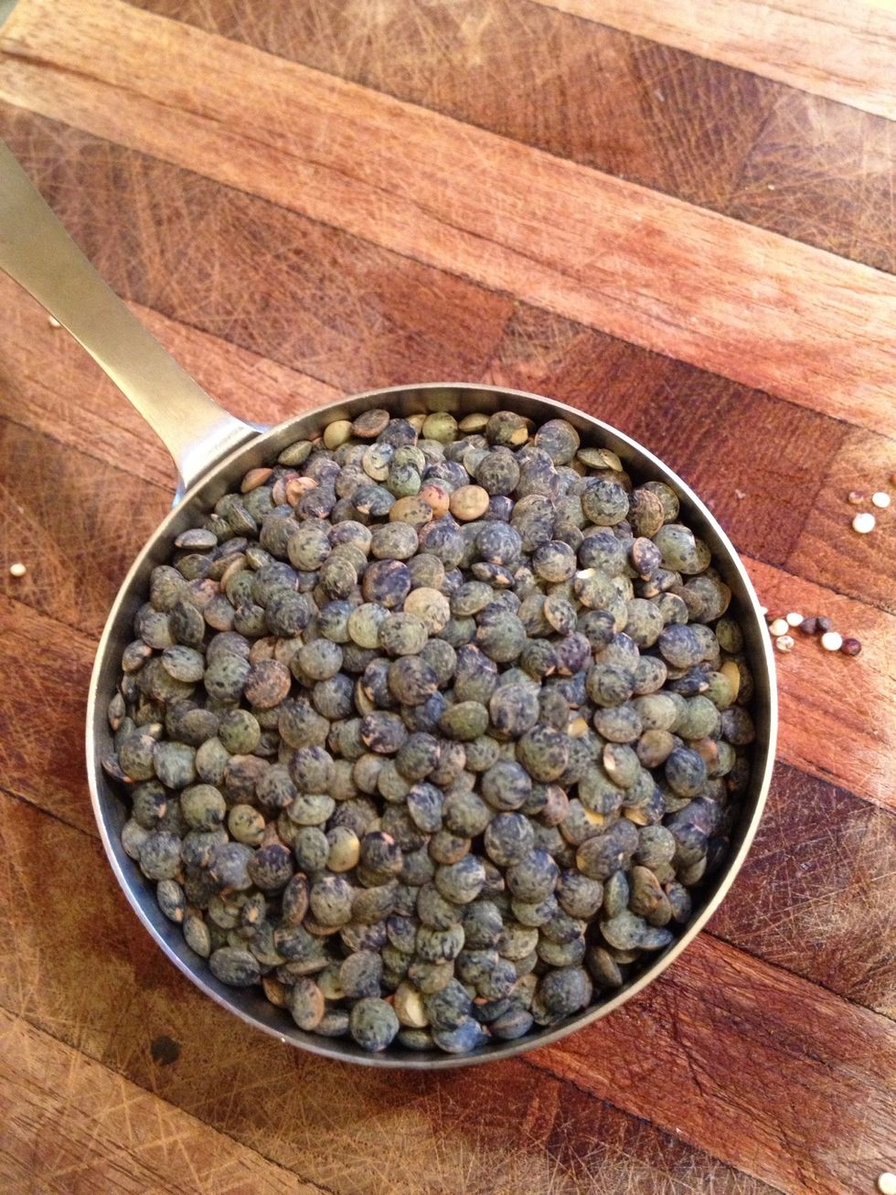 After you've added that rinsed quinoa to the pan, get ready to rinse your lentils. These French green lentils are small and stay whole through the long cooking. I buy them in the bulk foods section.