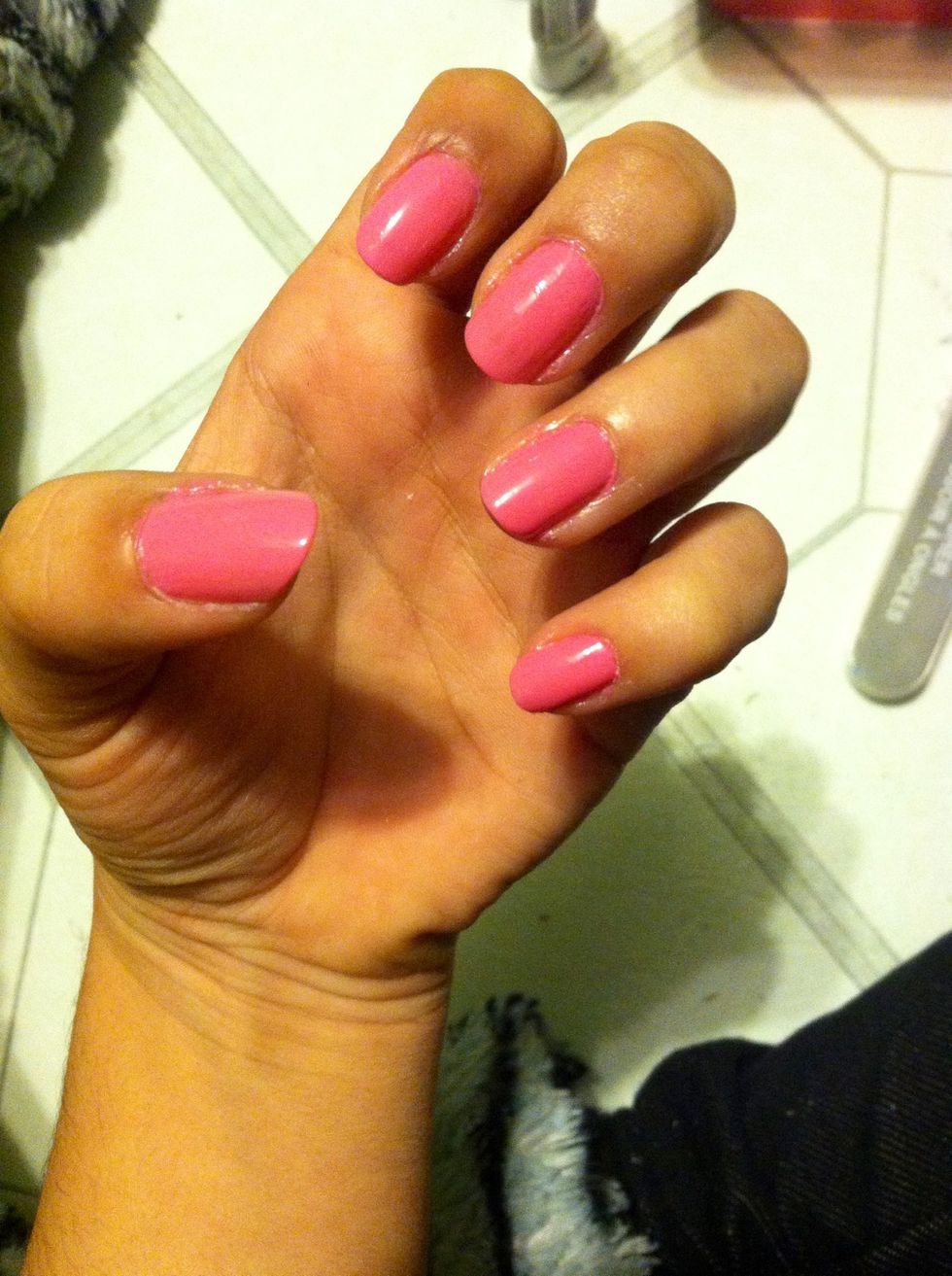 After you've applied you're base coat paint nails pink (double coated if needed)