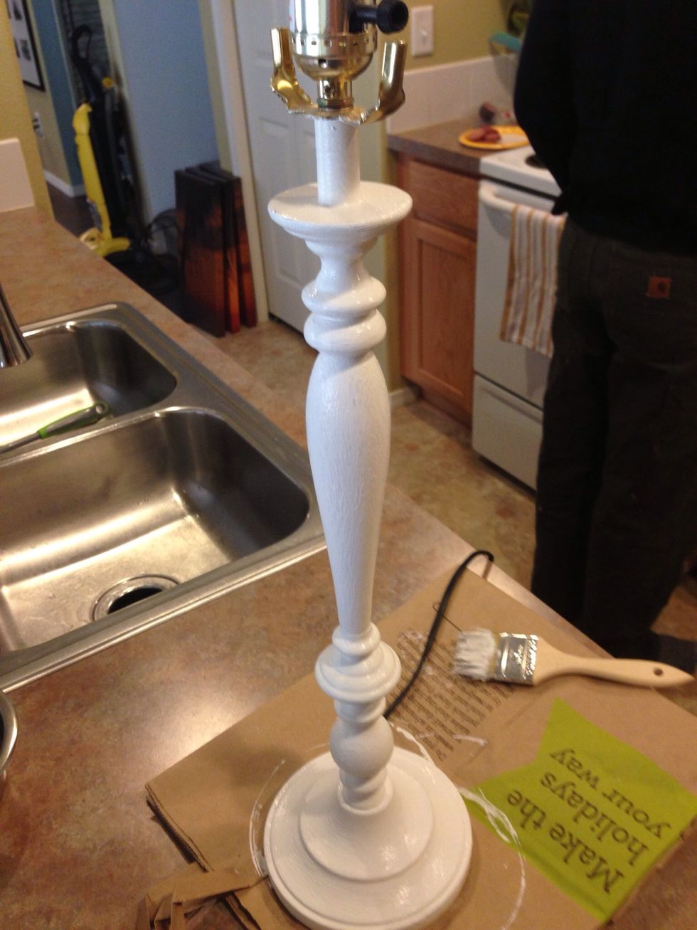 After you've determined the first coat of paint is dry, paint on your second coat.