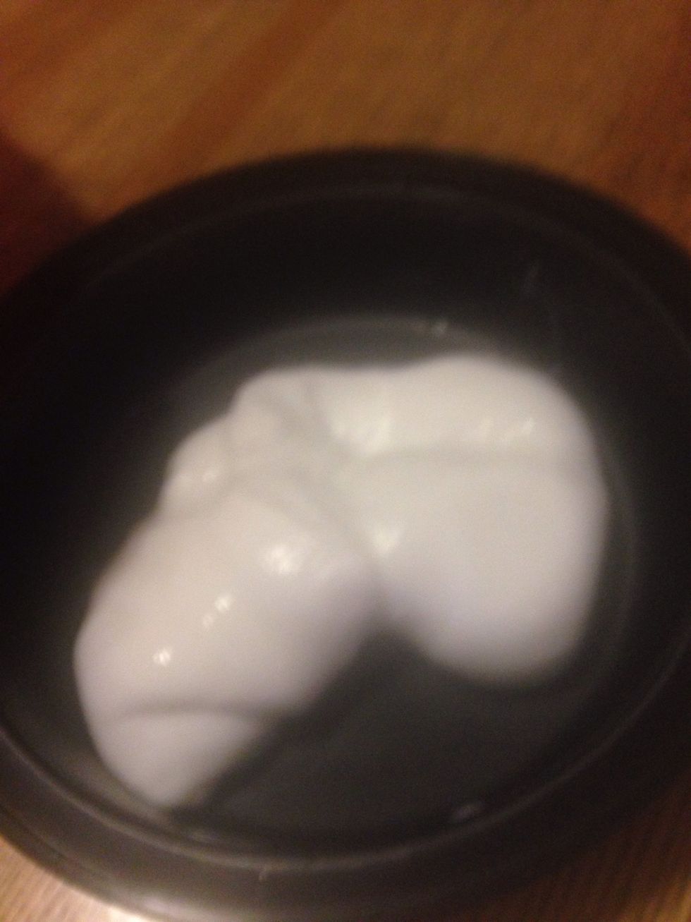 After you've got all your water out of your slime put your slime into a container and close your container shut.