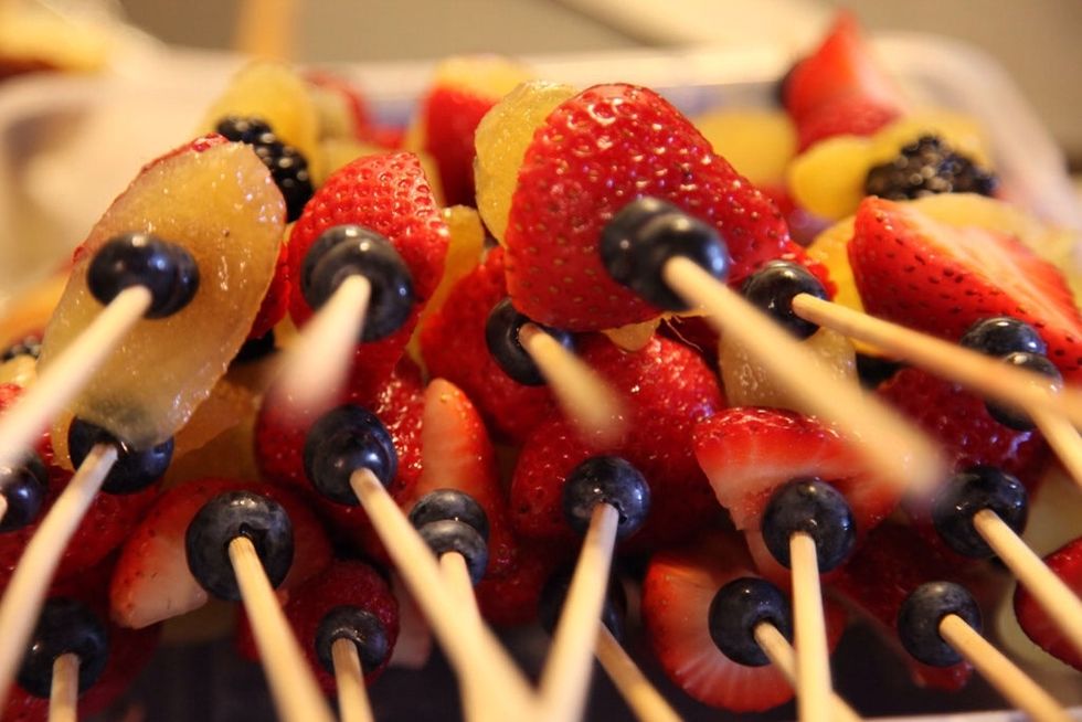 After you've made your skewers, create a coconut glaze by mixing 1 oz. DonQ Coco, Half can light coconut milk, Teaspoon vanilla extract in a small mixing bowl. Whisk together and Brush on fruit!