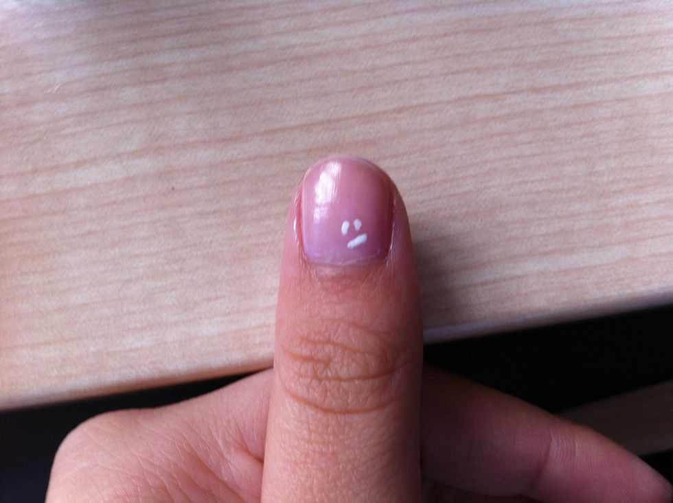 After you've painted your base coat (pale pink) add dots of white nail polish in a smile shape with a toothpick \ud83d\ude0f