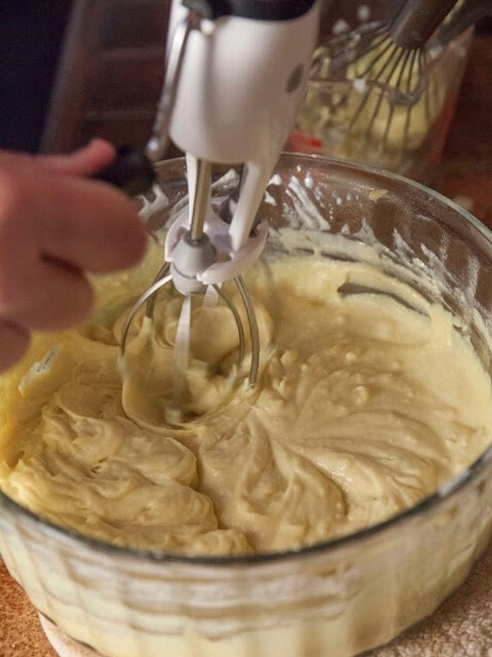 After you've smoothed the batter again, put it back into the microwave for another 1 and 1/2 minutes. Take it out again and give it another smoothing beating. You can use a mixer if you need to.