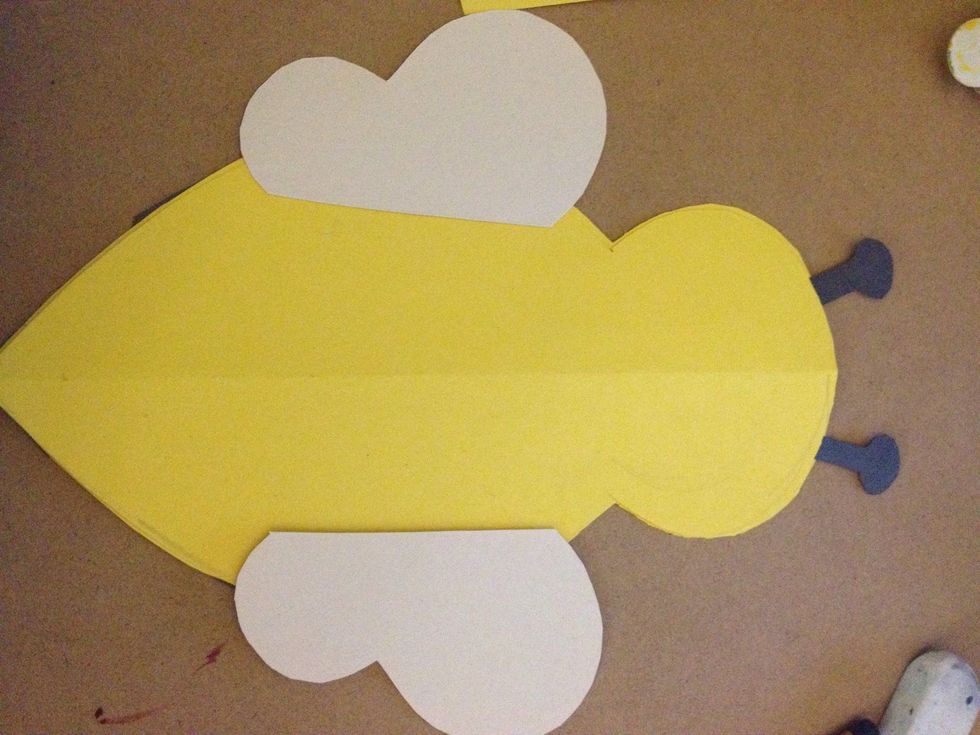 After you've stapled it, glue the wings onto the very back of the card.
