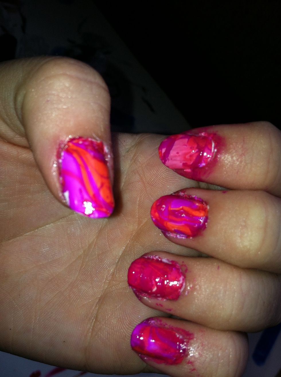 After you've taken your nail out, use a q-tip and nail polish remover to clean off the stuff on your finger. Then repeat the process on all of your nails! Mine need some cleanup.