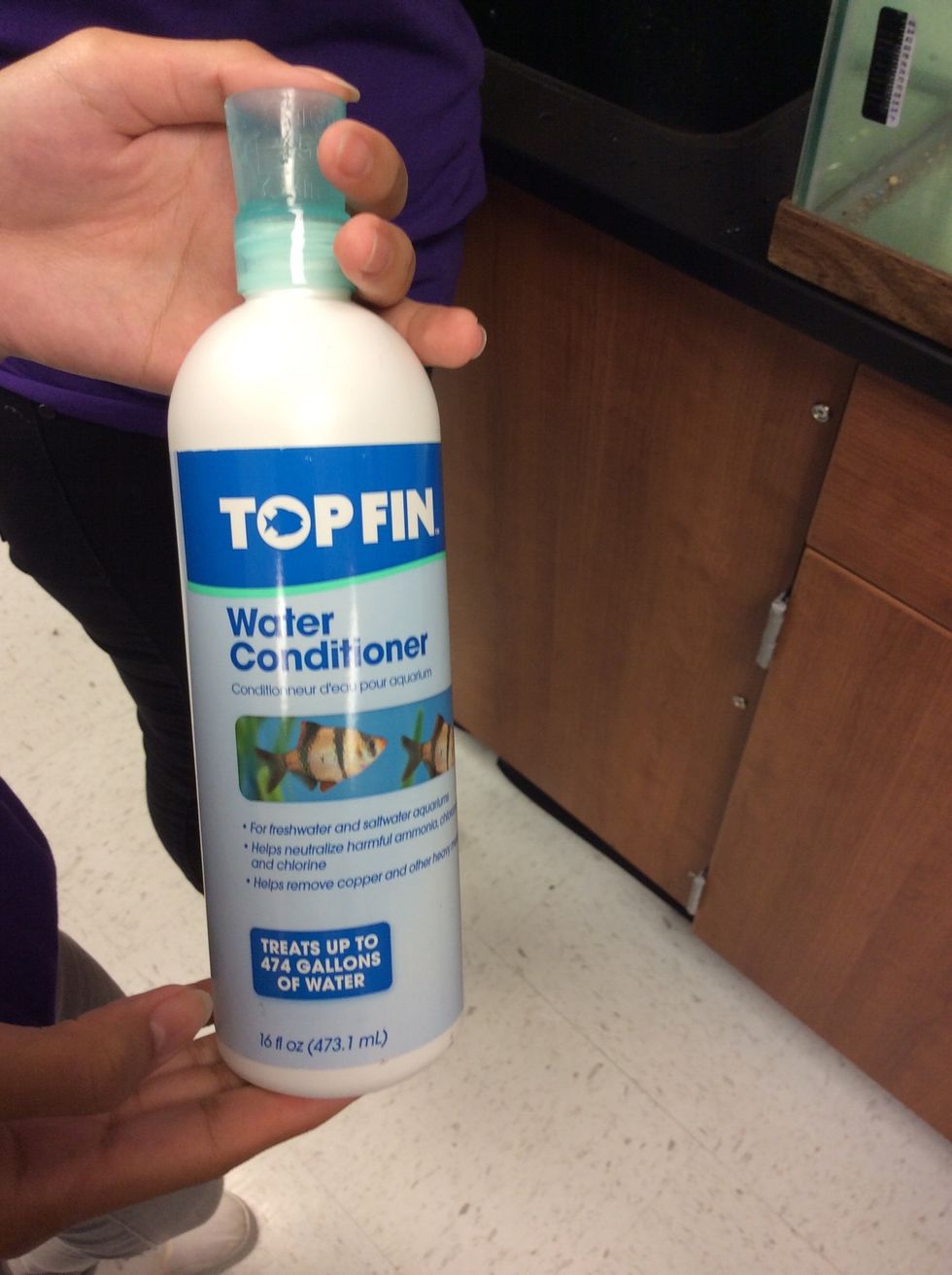 After, you will want to add water conditioner to the water. This is the brand we're using but any water conditioner you have should be good.