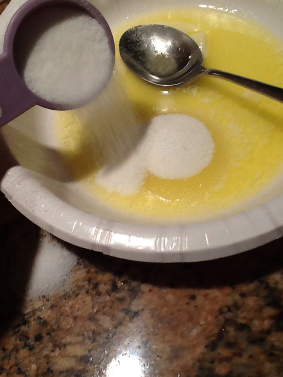 After your butter is melted pour in your 2 tablespoons of sugar.  Mix everything together