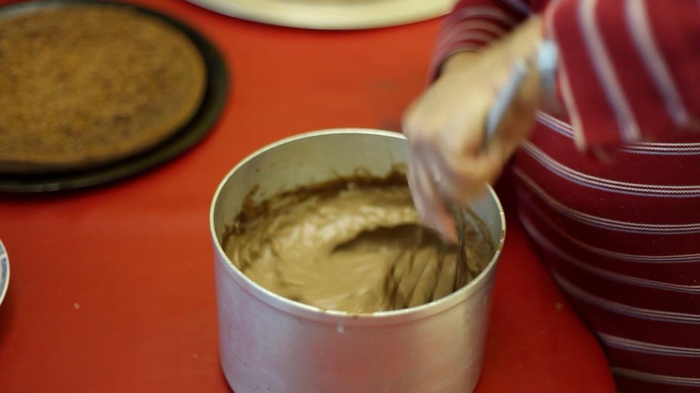 After your custard cream has cooled down, give it one last stir to make it easier to work with. It should be almost set but not hard. If its hard throw it in the bin. Tough love here. Lol
