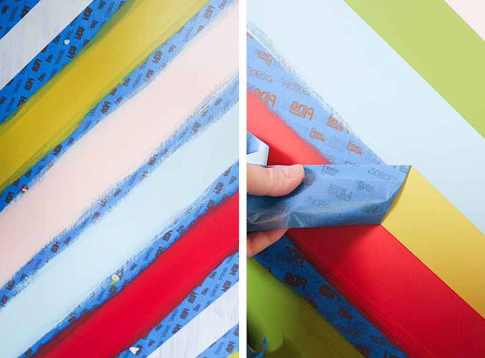 After your first set of stripes has been completed, remove the original tape. Tape a new set for the rest of your stripes and repeat the same process as before.