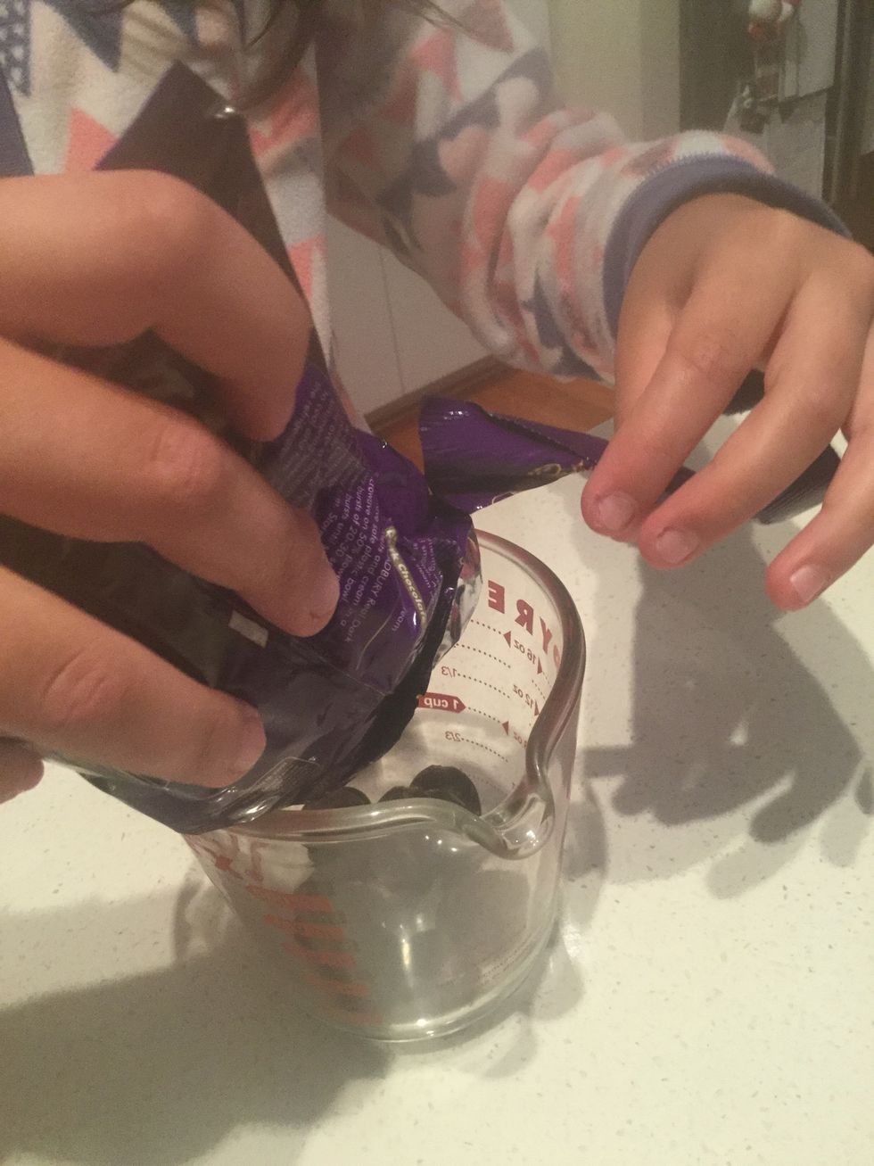 After your mixture has cooled down take 200g of chocolate and pour into a small heatproof jug.