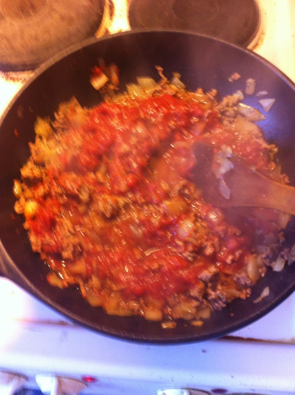 Afterward, put some amount of red wine if you have it, or you can put some vodka instead. The reason is to remove the weird smell of meat to some extend. Also, put certain amount of tomato paste.