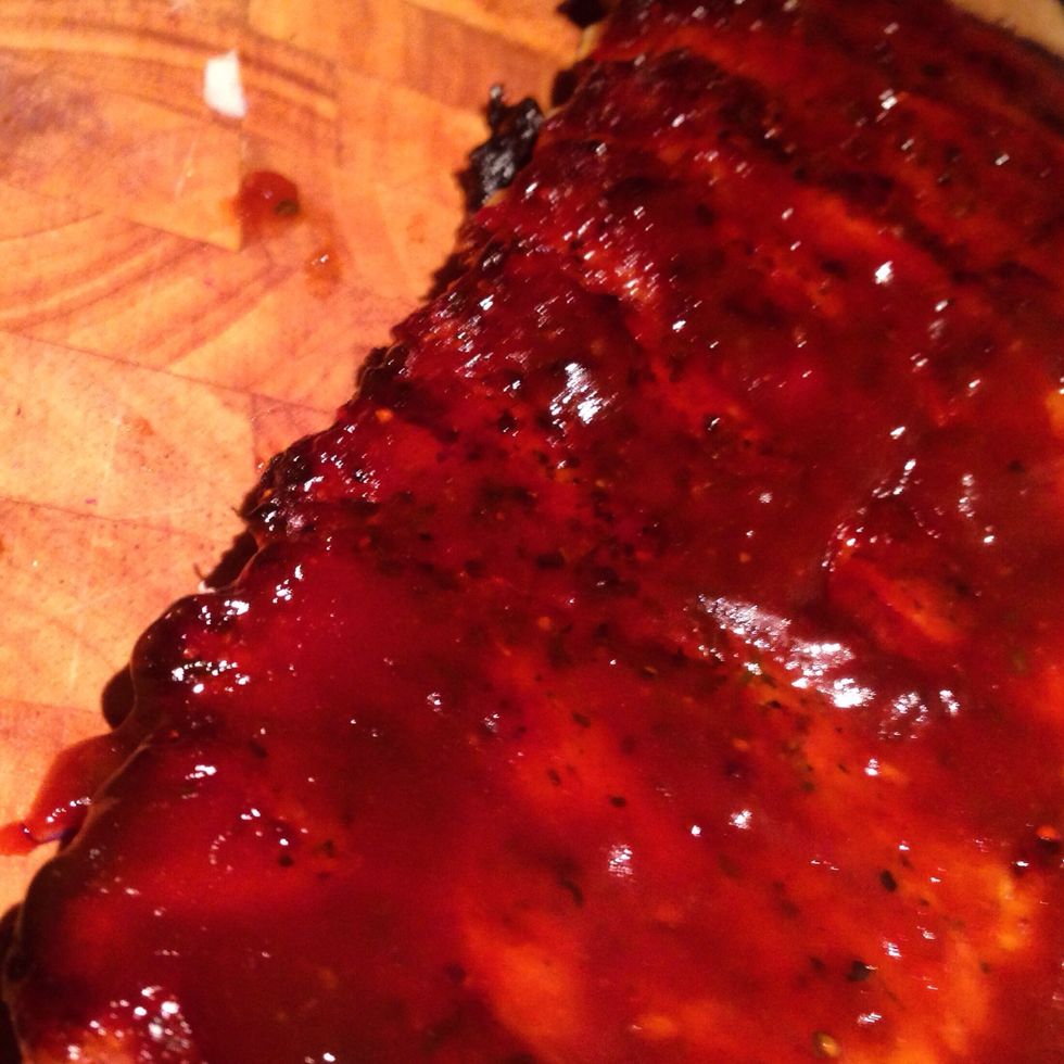 Again, after 45 mins, give the rack another coating. But this time raise the temp to 180c/ medium to high heat for 30 mins. The thicker and hotter the sauce, the darker it will become.