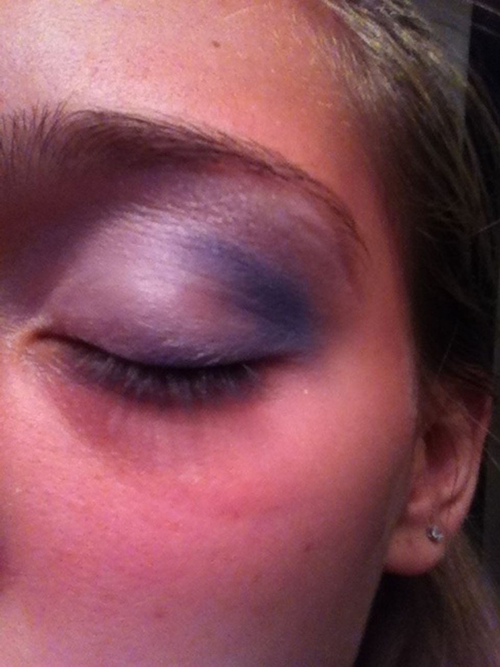 Again create the V shape between your crease and lid with your contour/eyeshadow brush.