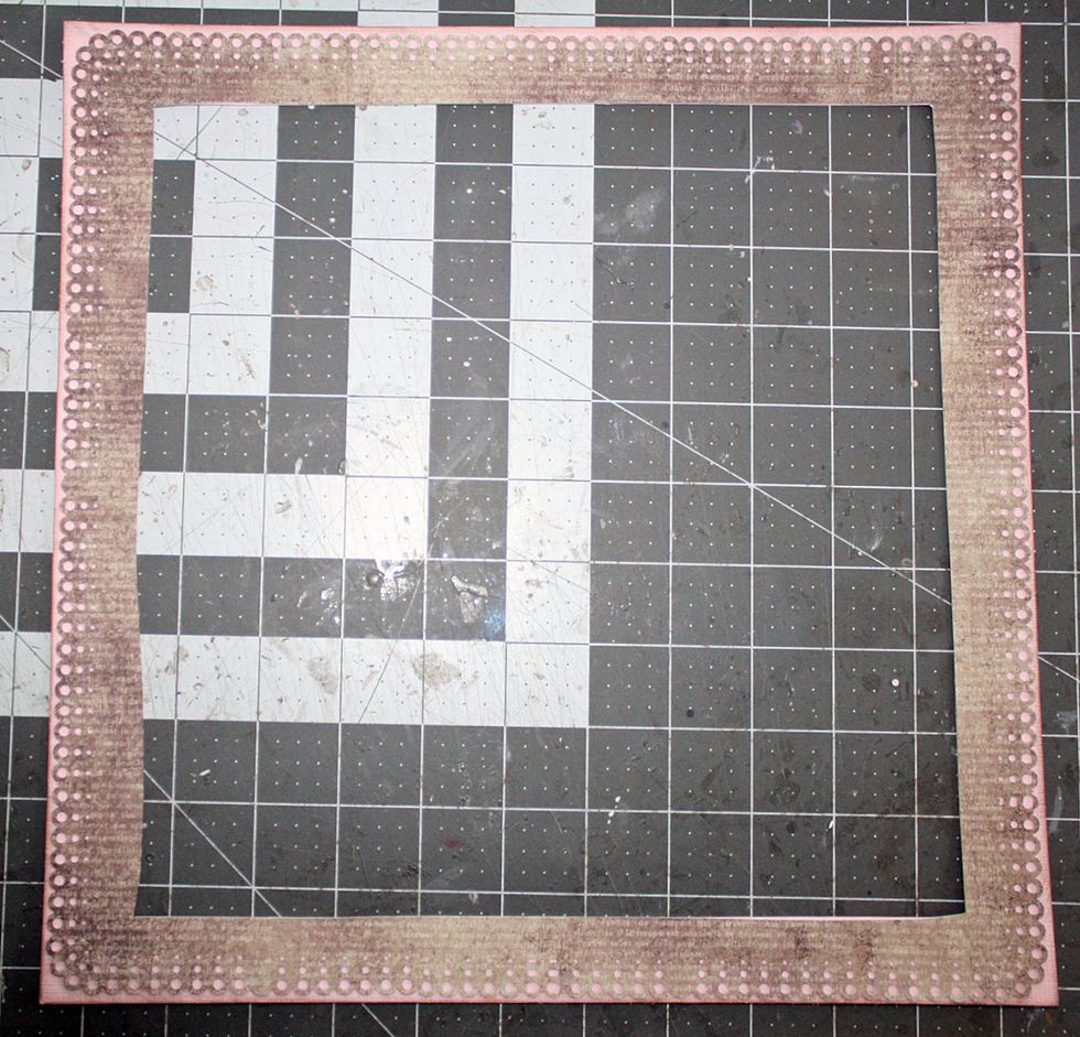 Again, cut out the center. In doing this you can save the center piece for more layering or another project.