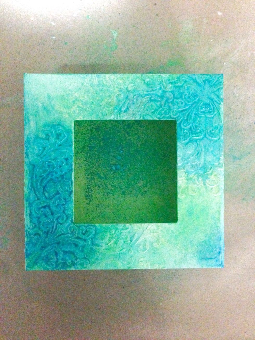 Again, intensify the colour by spraying it over the flourishes...