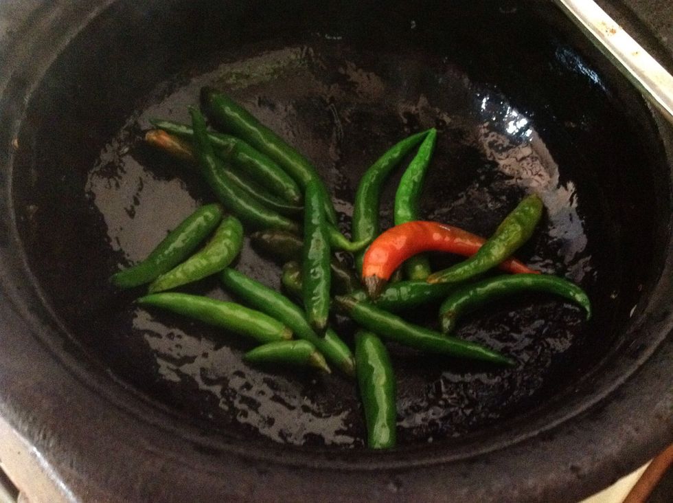 Again keep hot clay pot and add some oil again ..put in to spice and keep 3 min