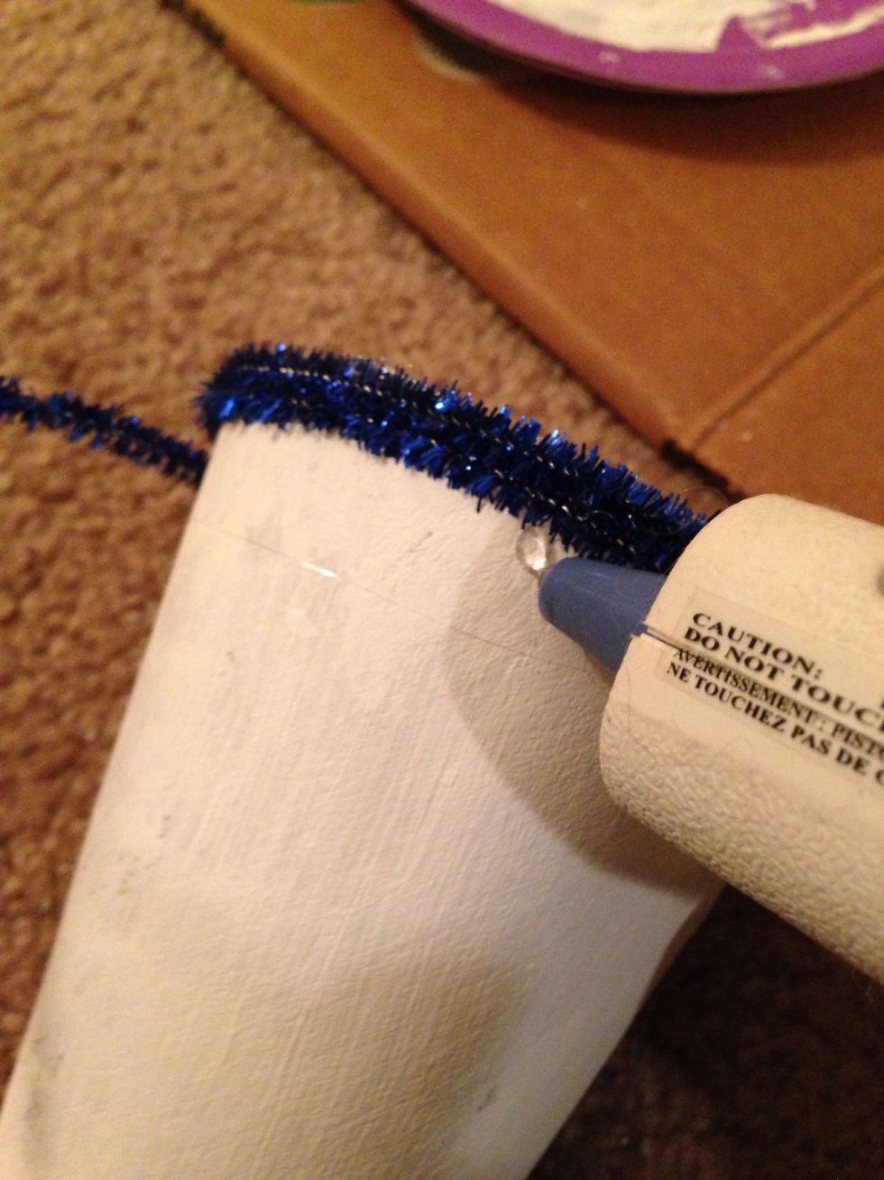 Again placing dots of glue all the way around