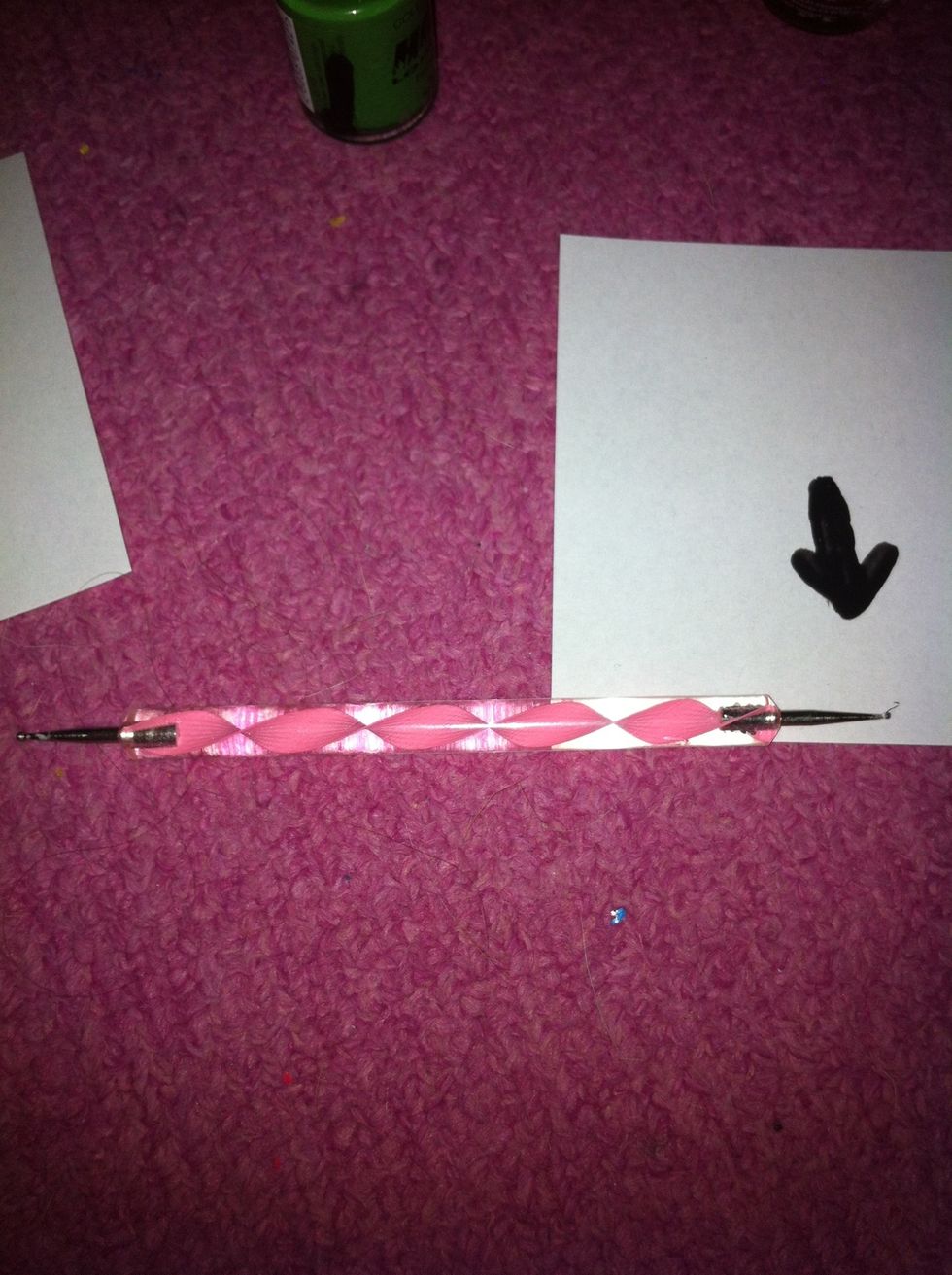 Again take the smaller dotting tool.