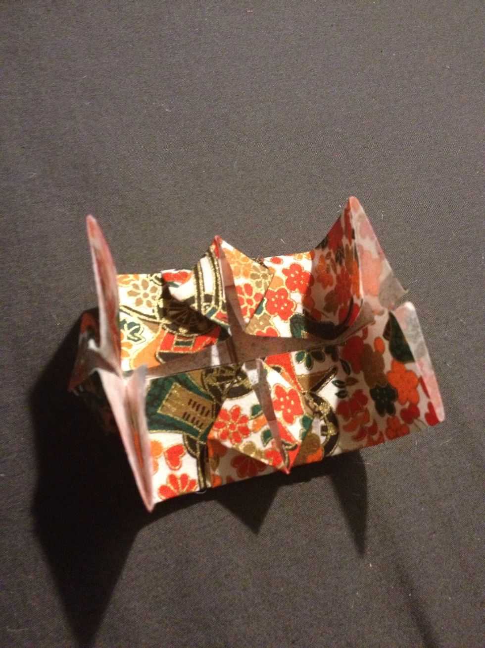 Again with the guiding lines, fold on top like so