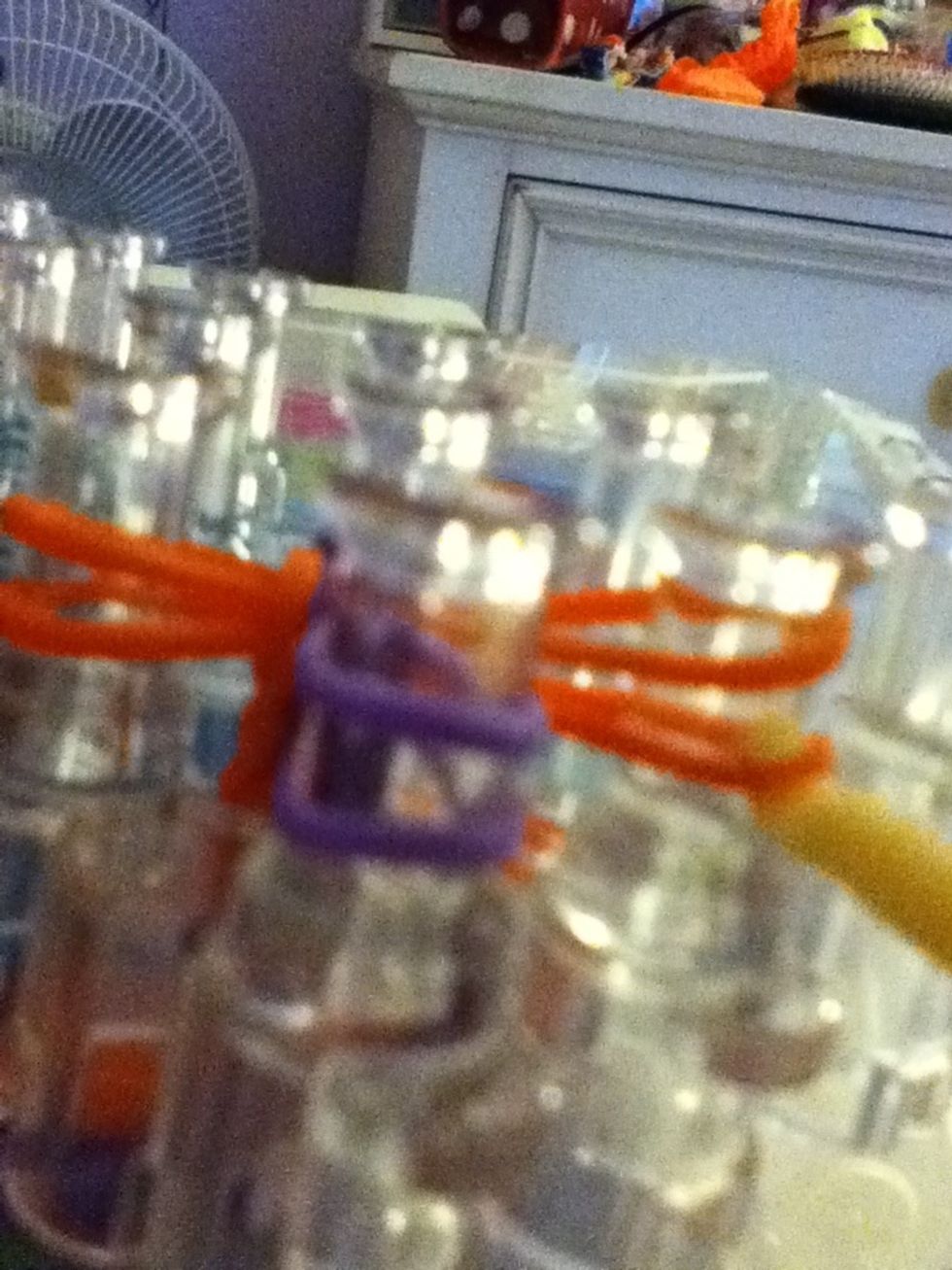 Agin take the bottom band and loop it over