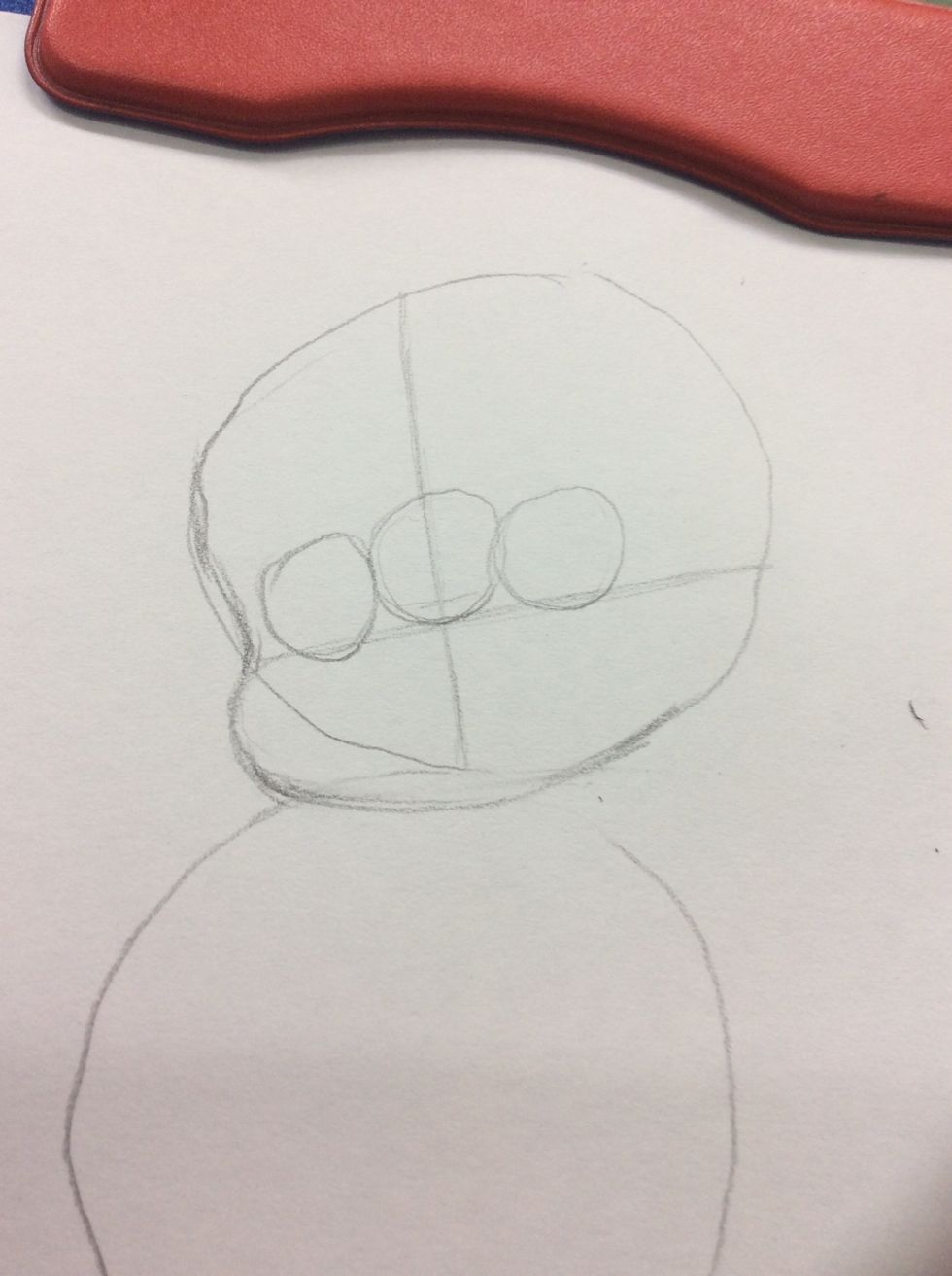 Agora fa\u00e7a tr\u00eas c\u00edrculos na cruz como de acordo com a imagem. Os c\u00edrculos dos cantos ser\u00e3o os olhos.