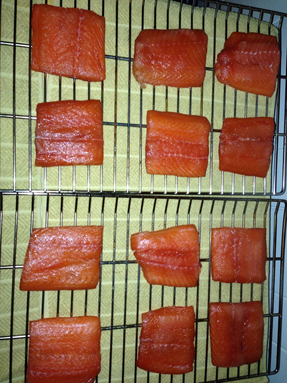 Air dry your fish for 2 - 4 hours, patting them now and then. You can help this process if you have a fan going nearby but it's not necessary. Let air get above and below them, using racks helps.